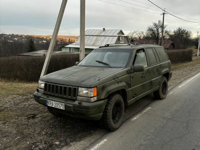 Зелений Джип Grand Cherokee, об'ємом двигуна 0.25 л та пробігом 240 тис. км за 1950 $, фото 1 на Automoto.ua