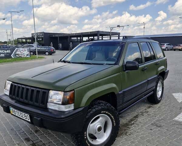 Зеленый Джип Гранд Чероки, объемом двигателя 4 л и пробегом 700 тыс. км за 6000 $, фото 1 на Automoto.ua