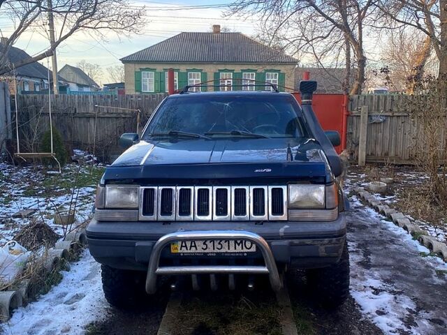 Зелений Джип Grand Cherokee, об'ємом двигуна 4 л та пробігом 330 тис. км за 3300 $, фото 1 на Automoto.ua