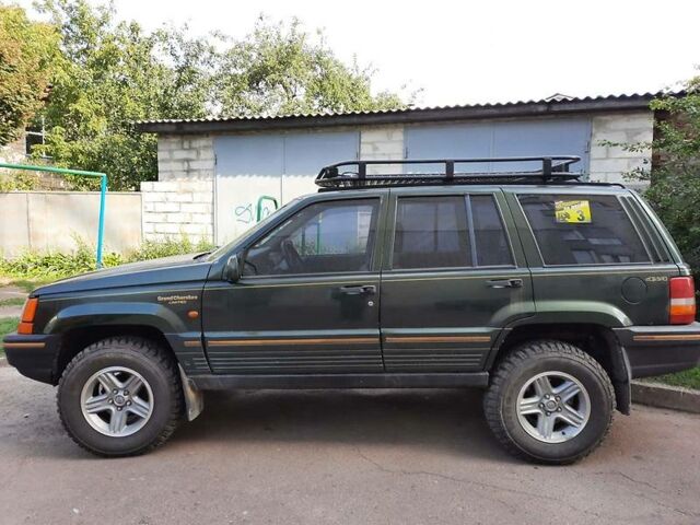 Зелений Джип Grand Cherokee, об'ємом двигуна 4 л та пробігом 278 тис. км за 6500 $, фото 1 на Automoto.ua