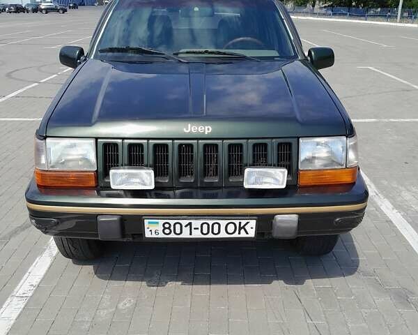 Зеленый Джип Гранд Чероки, объемом двигателя 4 л и пробегом 187 тыс. км за 5037 $, фото 1 на Automoto.ua