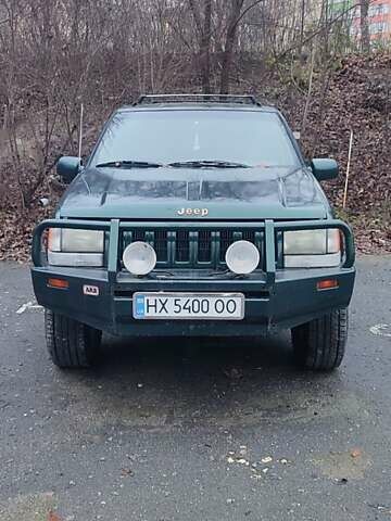 Зелений Джип Grand Cherokee, об'ємом двигуна 5.2 л та пробігом 421 тис. км за 3000 $, фото 1 на Automoto.ua