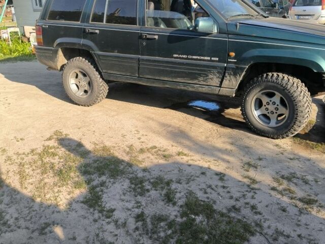 Зелений Джип Grand Cherokee, об'ємом двигуна 2.5 л та пробігом 300 тис. км за 1999 $, фото 1 на Automoto.ua