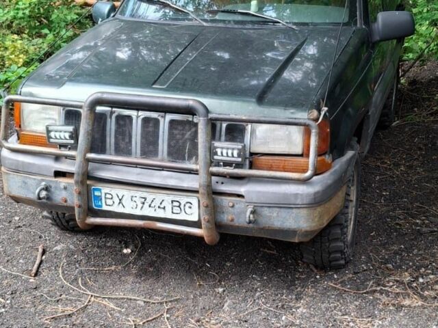 Зеленый Джип Гранд Чероки, объемом двигателя 2.5 л и пробегом 370 тыс. км за 3500 $, фото 1 на Automoto.ua