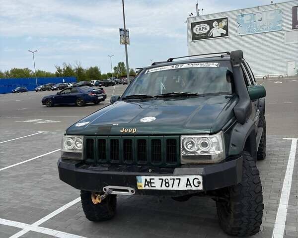 Зеленый Джип Гранд Чероки, объемом двигателя 3.96 л и пробегом 200 тыс. км за 4500 $, фото 1 на Automoto.ua