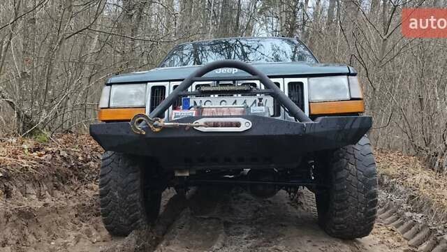 Зеленый Джип Гранд Чероки, объемом двигателя 2.5 л и пробегом 352 тыс. км за 4500 $, фото 1 на Automoto.ua