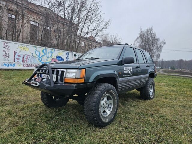 Зеленый Джип Гранд Чероки, объемом двигателя 2.5 л и пробегом 360 тыс. км за 3300 $, фото 1 на Automoto.ua