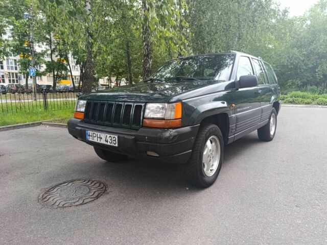Зелений Джип Grand Cherokee, об'ємом двигуна 2.5 л та пробігом 248 тис. км за 3300 $, фото 1 на Automoto.ua