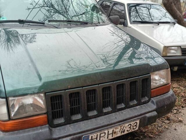 Зелений Джип Grand Cherokee, об'ємом двигуна 2.5 л та пробігом 350 тис. км за 3300 $, фото 1 на Automoto.ua
