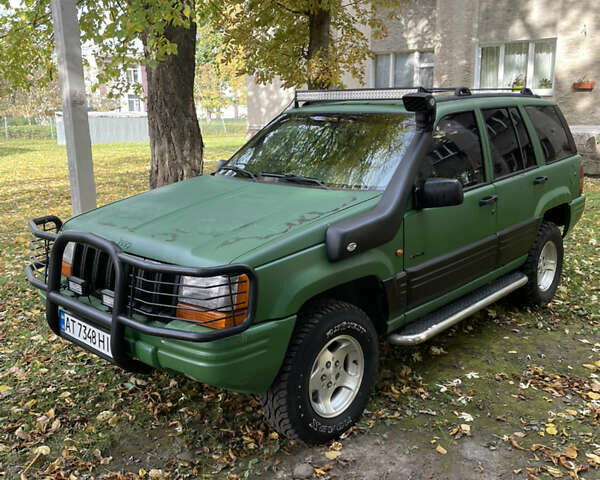 Зелений Джип Grand Cherokee, об'ємом двигуна 2.5 л та пробігом 315 тис. км за 7800 $, фото 1 на Automoto.ua