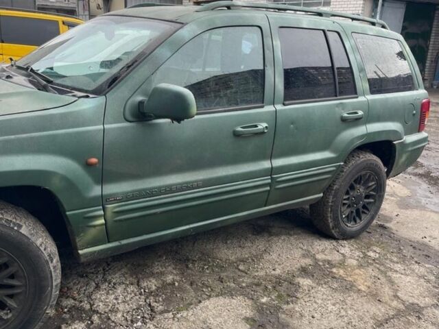 Зеленый Джип Гранд Чероки, объемом двигателя 3.1 л и пробегом 250 тыс. км за 2248 $, фото 1 на Automoto.ua