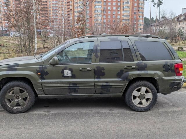 Зелений Джип Grand Cherokee, об'ємом двигуна 3.1 л та пробігом 270 тис. км за 1800 $, фото 1 на Automoto.ua