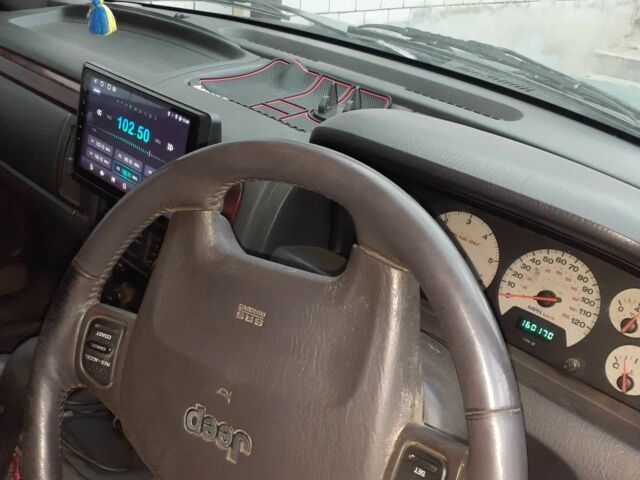 Зеленый Джип Гранд Чероки, объемом двигателя 3.1 л и пробегом 256 тыс. км за 4200 $, фото 1 на Automoto.ua