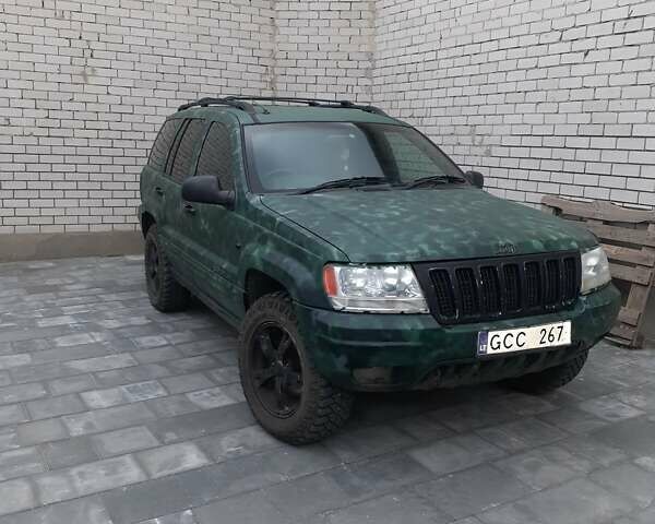 Зеленый Джип Гранд Чероки, объемом двигателя 3.12 л и пробегом 256 тыс. км за 4200 $, фото 1 на Automoto.ua