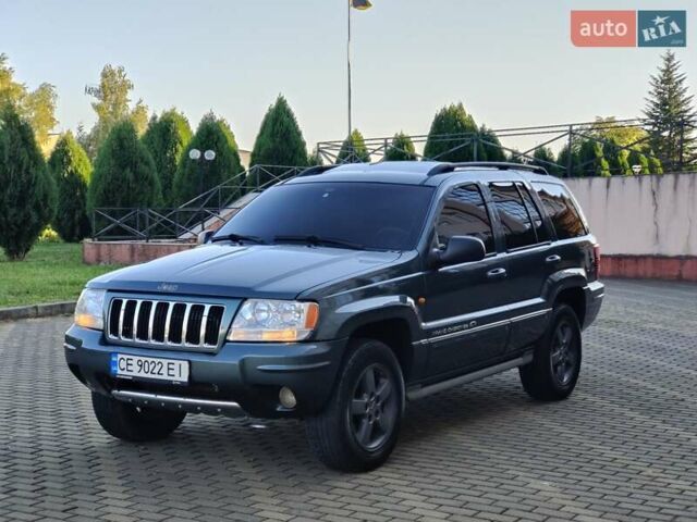 Зелений Джип Grand Cherokee, об'ємом двигуна 2.7 л та пробігом 374 тис. км за 9300 $, фото 1 на Automoto.ua