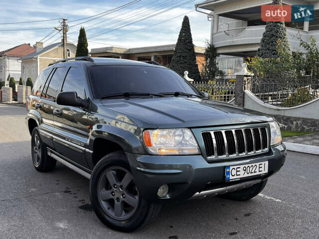 Зелений Джип Grand Cherokee, об'ємом двигуна 2.7 л та пробігом 376 тис. км за 9800 $, фото 1 на Automoto.ua