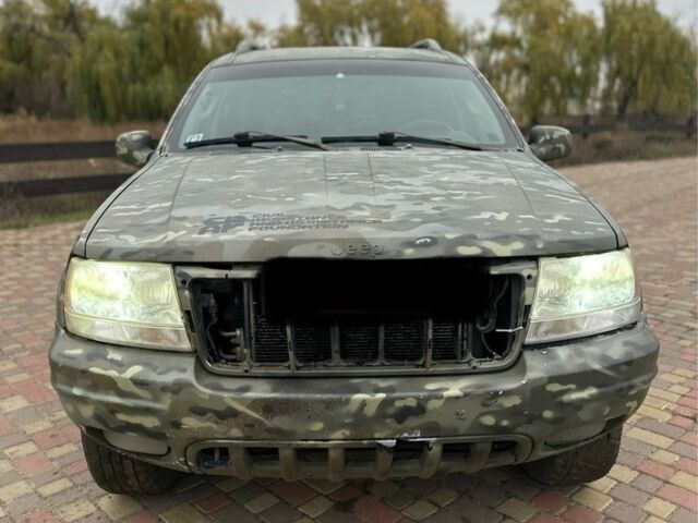 Зеленый Джип Гранд Чероки, объемом двигателя 2.7 л и пробегом 222 тыс. км за 3800 $, фото 1 на Automoto.ua