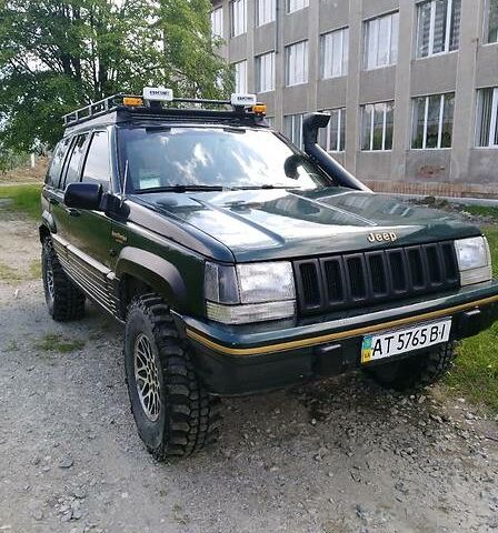 Зелений Джип Grand Cherokee, об'ємом двигуна 4 л та пробігом 288 тис. км за 6700 $, фото 1 на Automoto.ua