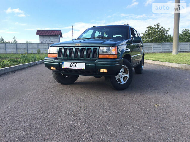 Зелений Джип Grand Cherokee, об'ємом двигуна 2.5 л та пробігом 270 тис. км за 6500 $, фото 1 на Automoto.ua