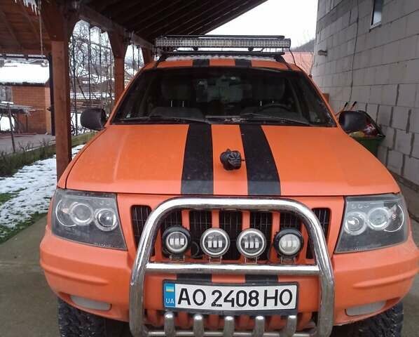Помаранчевий Джип Grand Cherokee, об'ємом двигуна 4.7 л та пробігом 259 тис. км за 7000 $, фото 1 на Automoto.ua