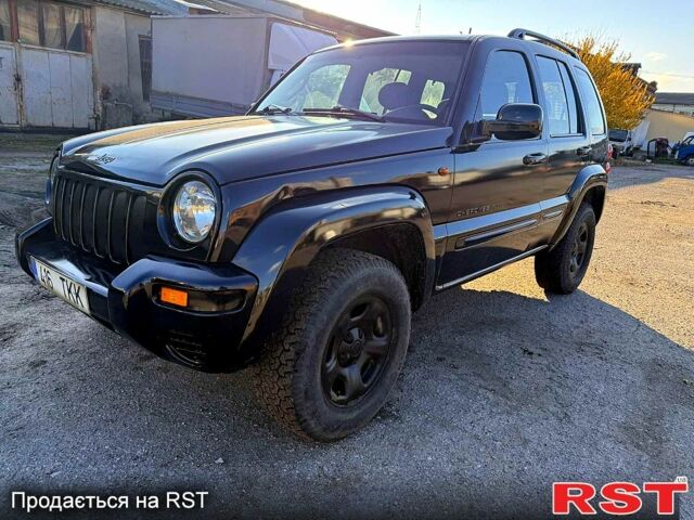 Черный Джип Либерти, объемом двигателя 2.5 л и пробегом 234 тыс. км за 2800 $, фото 1 на Automoto.ua