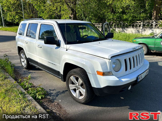 Білий Джип Patriot, об'ємом двигуна 2.4 л та пробігом 167 тис. км за 12300 $, фото 1 на Automoto.ua