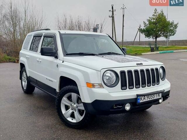 Білий Джип Patriot, об'ємом двигуна 2.4 л та пробігом 113 тис. км за 11300 $, фото 1 на Automoto.ua