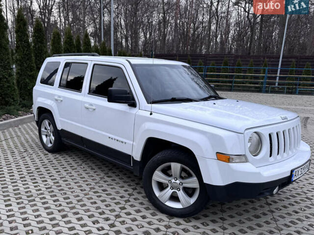 Білий Джип Patriot, об'ємом двигуна 2.36 л та пробігом 140 тис. км за 10000 $, фото 1 на Automoto.ua