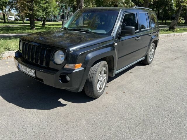 Черный Джип Патриот, объемом двигателя 2.4 л и пробегом 250 тыс. км за 5900 $, фото 1 на Automoto.ua