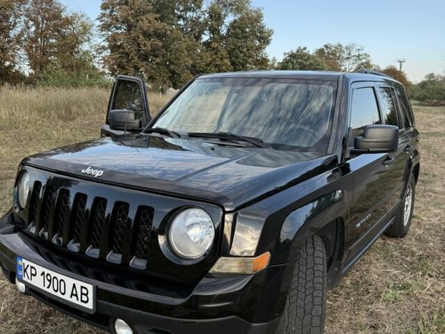 Чорний Джип Patriot, об'ємом двигуна 2 л та пробігом 201 тис. км за 8437 $, фото 1 на Automoto.ua