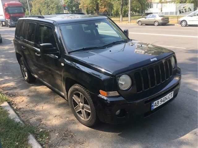 Чорний Джип Patriot, об'ємом двигуна 2.4 л та пробігом 296 тис. км за 7500 $, фото 1 на Automoto.ua