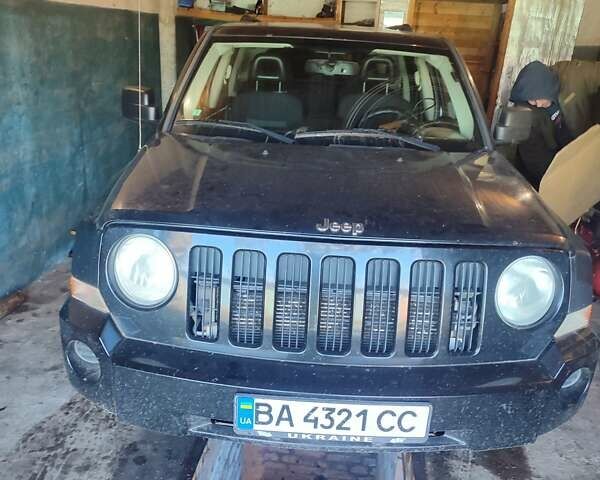 Черный Джип Патриот, объемом двигателя 2.36 л и пробегом 280 тыс. км за 4500 $, фото 1 на Automoto.ua