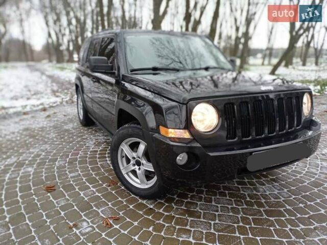 Чорний Джип Patriot, об'ємом двигуна 2.4 л та пробігом 120 тис. км за 8300 $, фото 1 на Automoto.ua