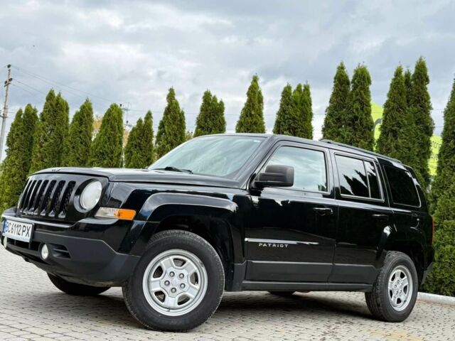 Черный Джип Патриот, объемом двигателя 2.4 л и пробегом 195 тыс. км за 7999 $, фото 1 на Automoto.ua
