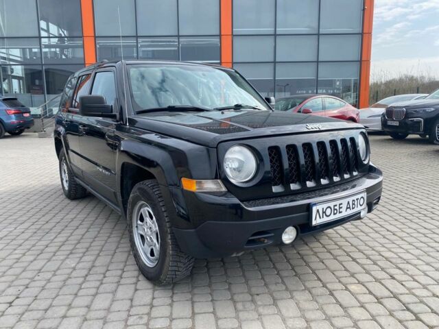 Черный Джип Патриот, объемом двигателя 2.4 л и пробегом 310 тыс. км за 8800 $, фото 1 на Automoto.ua