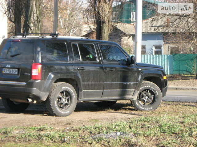 Чорний Джип Patriot, об'ємом двигуна 2.4 л та пробігом 170 тис. км за 9000 $, фото 1 на Automoto.ua