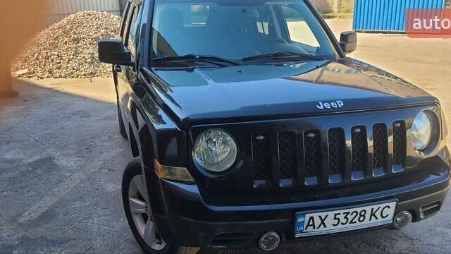 Чорний Джип Patriot, об'ємом двигуна 2.36 л та пробігом 160 тис. км за 10500 $, фото 1 на Automoto.ua