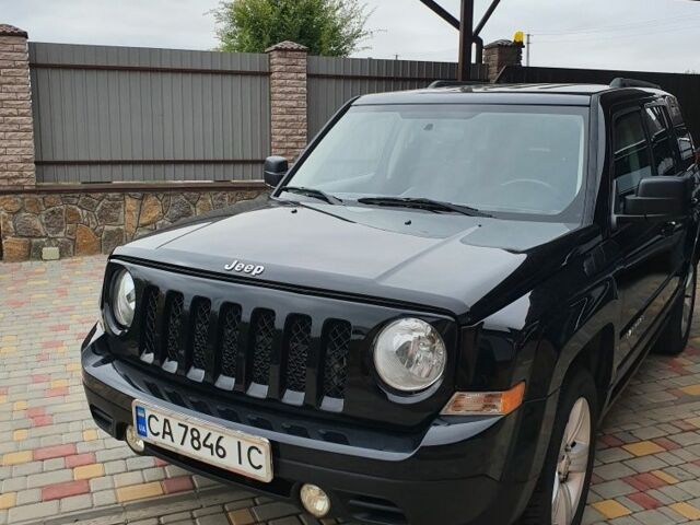 Черный Джип Патриот, объемом двигателя 2.4 л и пробегом 154 тыс. км за 10500 $, фото 1 на Automoto.ua
