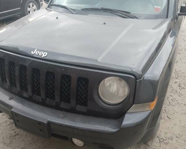 Чорний Джип Patriot, об'ємом двигуна 2.4 л та пробігом 285 тис. км за 8000 $, фото 1 на Automoto.ua