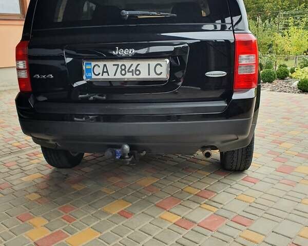 Черный Джип Патриот, объемом двигателя 2.36 л и пробегом 155 тыс. км за 10500 $, фото 1 на Automoto.ua