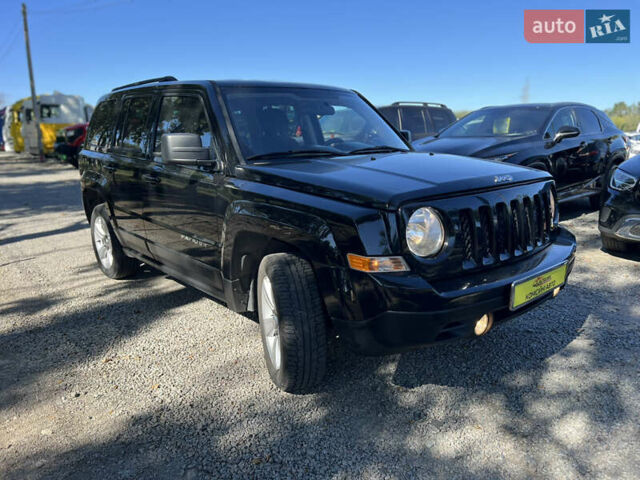 Чорний Джип Patriot, об'ємом двигуна 2.4 л та пробігом 155 тис. км за 11300 $, фото 1 на Automoto.ua