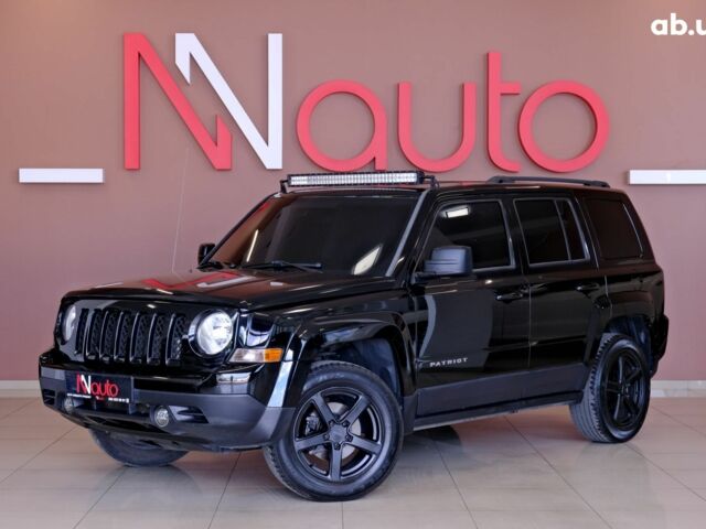 Чорний Джип Patriot, об'ємом двигуна 2.4 л та пробігом 123 тис. км за 9900 $, фото 1 на Automoto.ua
