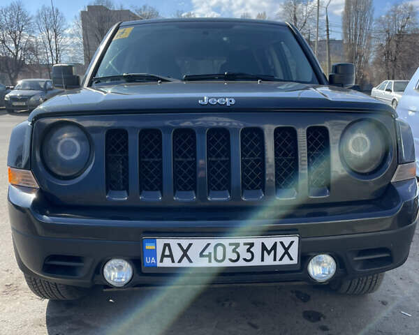 Черный Джип Патриот, объемом двигателя 2.4 л и пробегом 250 тыс. км за 11600 $, фото 1 на Automoto.ua