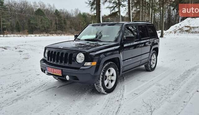 Черный Джип Патриот, объемом двигателя 2.4 л и пробегом 157 тыс. км за 9700 $, фото 1 на Automoto.ua