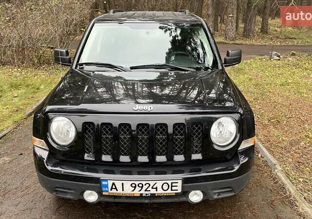 Черный Джип Патриот, объемом двигателя 2.36 л и пробегом 157 тыс. км за 9400 $, фото 1 на Automoto.ua