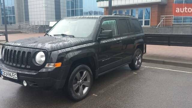 Черный Джип Патриот, объемом двигателя 2.36 л и пробегом 180 тыс. км за 9700 $, фото 1 на Automoto.ua