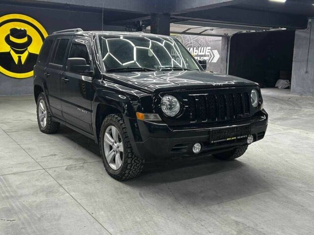 Чорний Джип Patriot, об'ємом двигуна 2.4 л та пробігом 104 тис. км за 11100 $, фото 1 на Automoto.ua