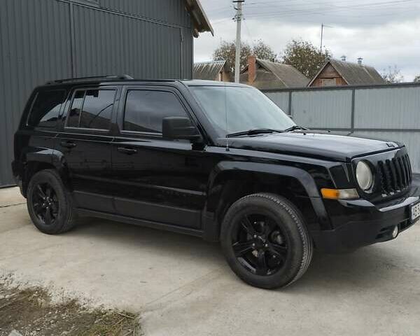 Чорний Джип Patriot, об'ємом двигуна 2 л та пробігом 248 тис. км за 11000 $, фото 1 на Automoto.ua
