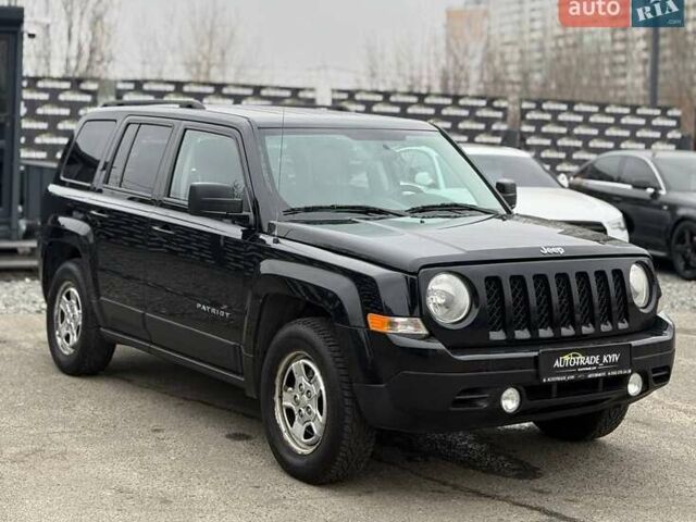 Черный Джип Патриот, объемом двигателя 2.36 л и пробегом 241 тыс. км за 8800 $, фото 1 на Automoto.ua