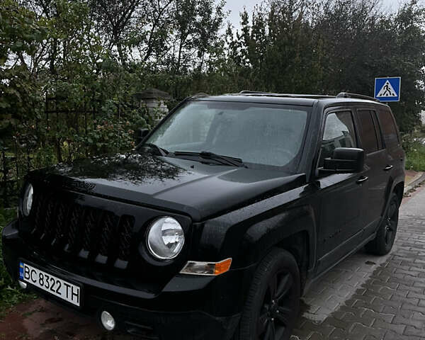 Чорний Джип Patriot, об'ємом двигуна 2 л та пробігом 157 тис. км за 10500 $, фото 1 на Automoto.ua